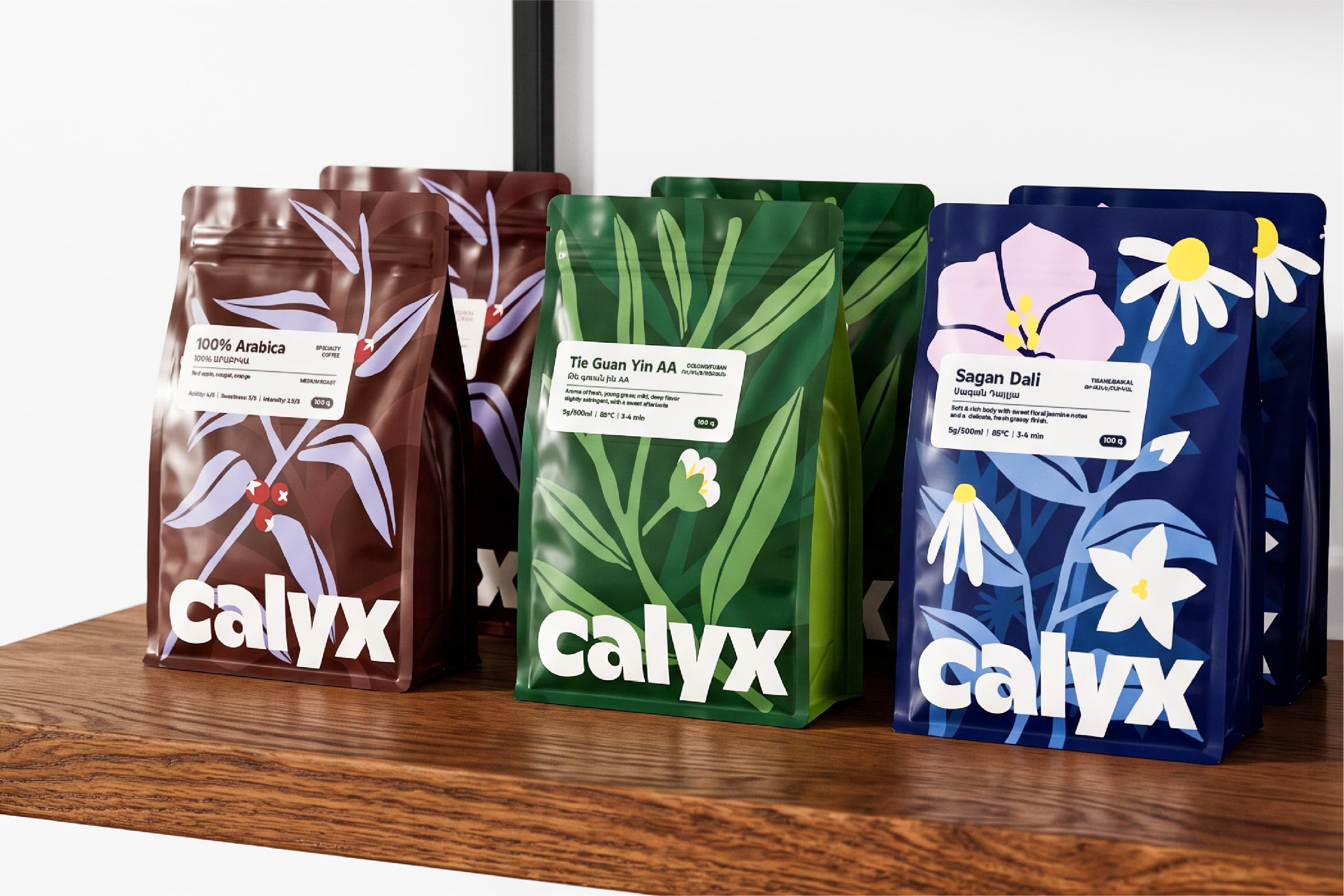 Calyx tea packaging in three botanical colors